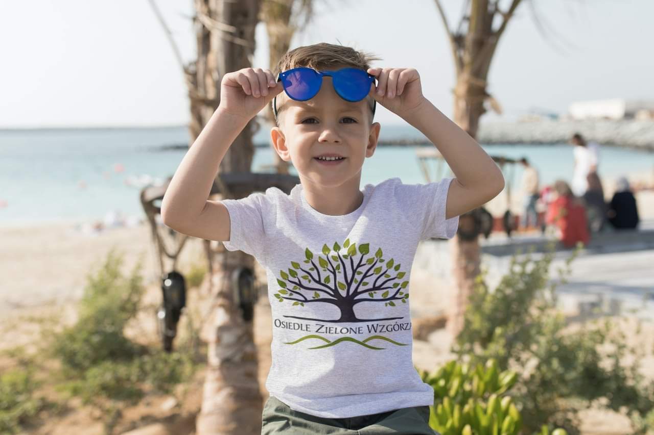 child-with-t-shirt-with-logotype-of-real-estate-project.jpg