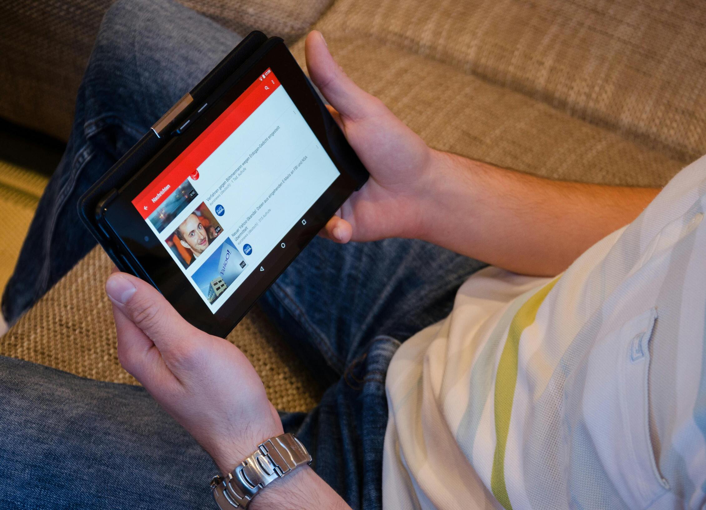 men-watching-youtube-videos-on-tablet.jpg